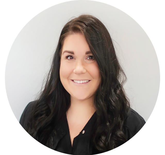 Shannon, dental assistant at Bass Dentistry, smiling warmly in a black uniform, helping patients feel comfortable during dental treatment in Gastonia, NC